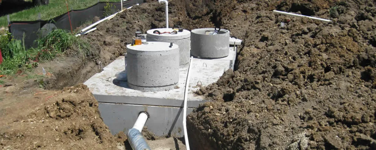 Septic system repair and installation site with tank access ports in Vancouver, WA